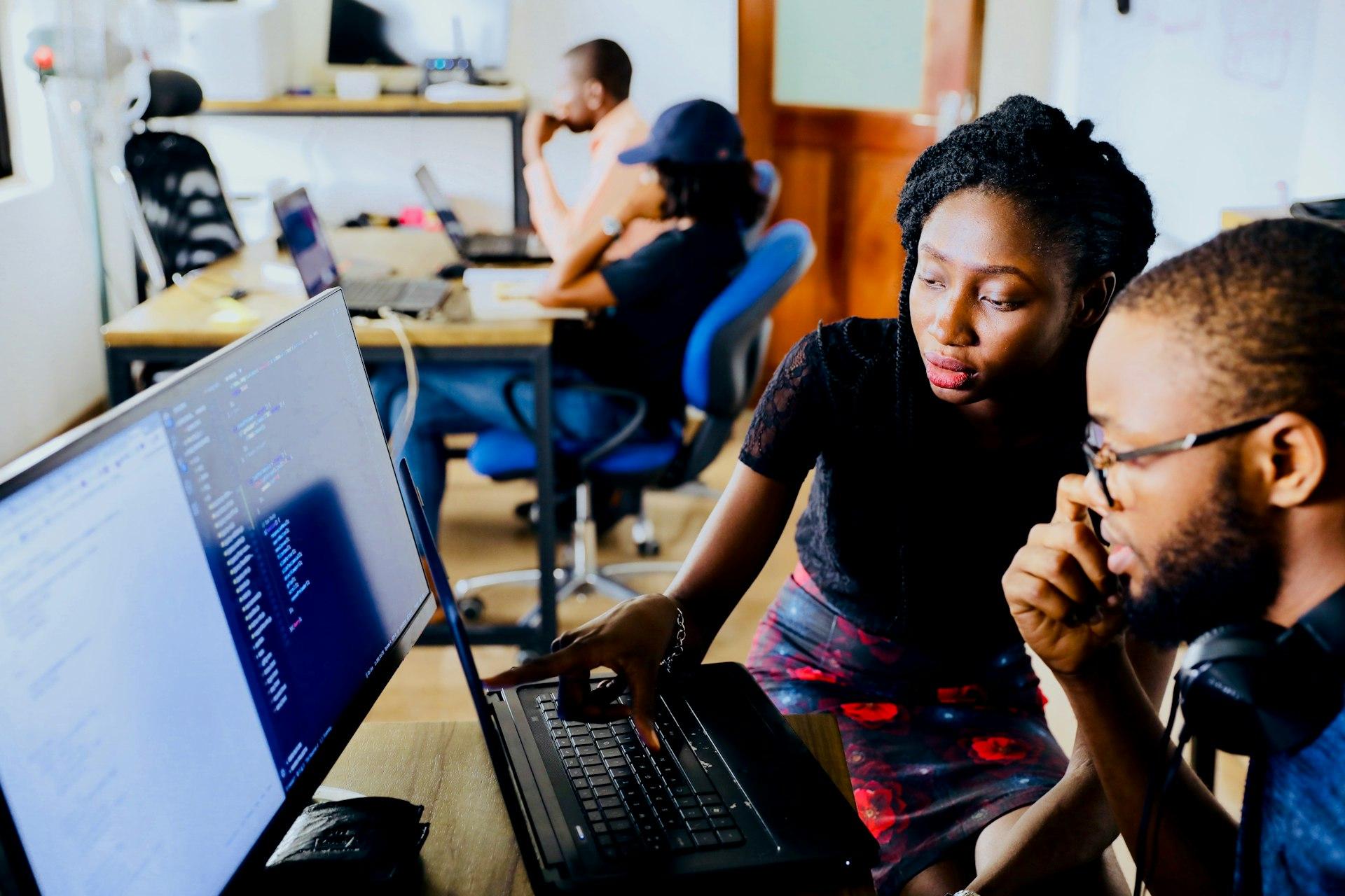 Developers collaborating at a hackathon
